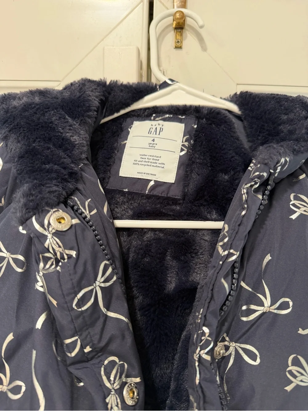 GAP Navy Puffer Jacket with White Bow Print and Faux Fur Hood